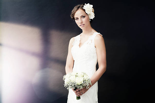 istock Stunning young bride holding bouquet 514915051