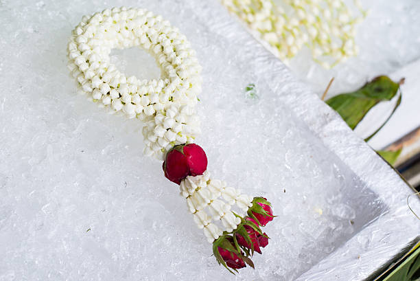 istock Beautiful Thai jasmine garland and red rose 514915155
