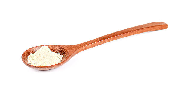 istock Wasabi powder in wooden spoon on white background. 514915254
