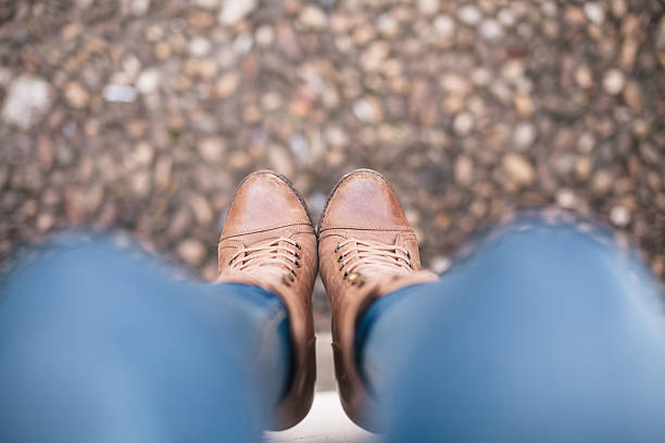 istock Conceptual image of legs in boots. 514915640
