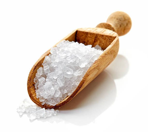 istock Granulated sea salt on white background 514916242