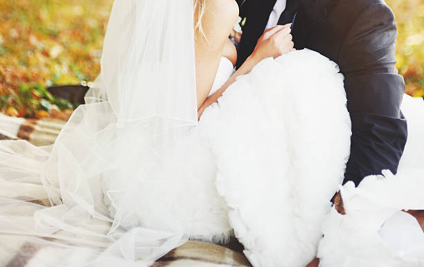 istock Newly wed couple holding hands. 514916259
