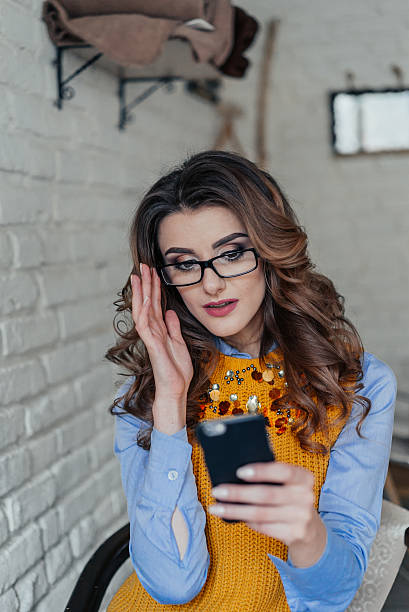 istock Beautiful girl with glasses in cafe 514917156