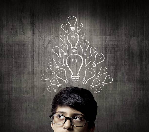 istock Thinking Half Head Of Genius Little Boy Wearing Glasses 514917536