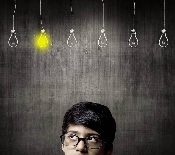 istock Thinking Half Head Of Genius Little Boy Wearing Glasses 514917616