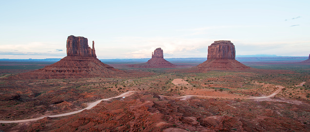 Monument Valley National Park rock formations are some of the most definitive images of the American West. The isolated red mesas and buttes surrounded by empty, sandy desert have been filmed and photographed countless times over the years for movies and commercials.