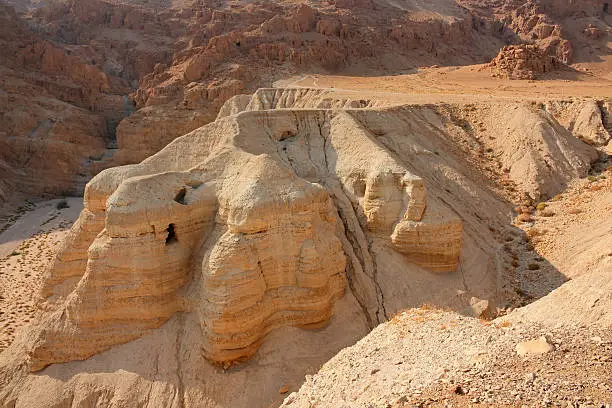 Qumran caves at the archaeological site in the Judean desert of the West Bank, Israel