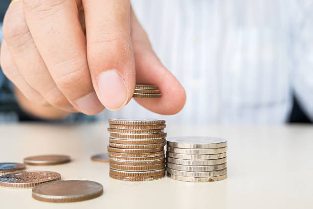 istock Hand put coins to stack of coins, business ideas 514924608