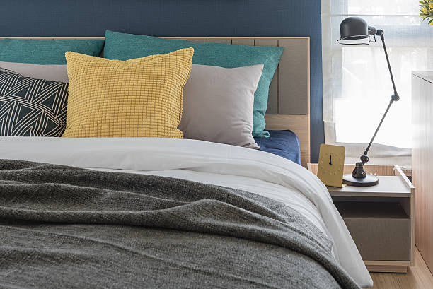 istock modern bedroom with colorful pillows 514926472
