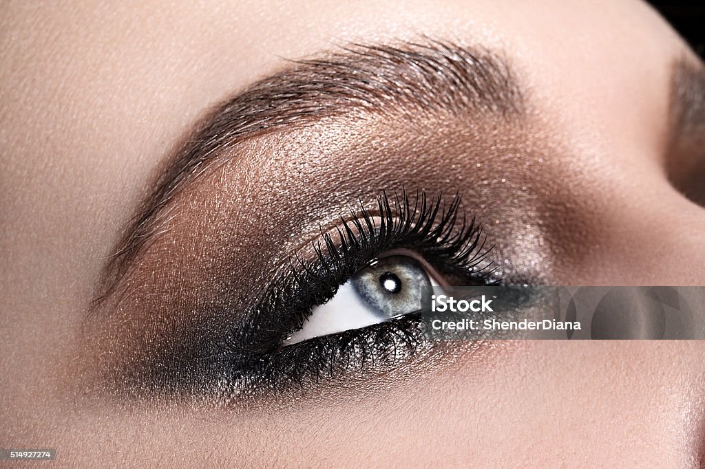 beautiful woman's eye close up macro beautiful woman's blue eye close up macro Make-Up Stock Photo