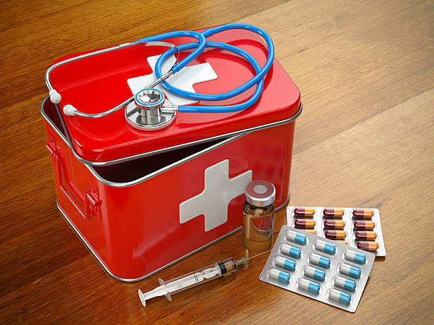 istock First aid kit with stethoscope, pills and syringe 514930590