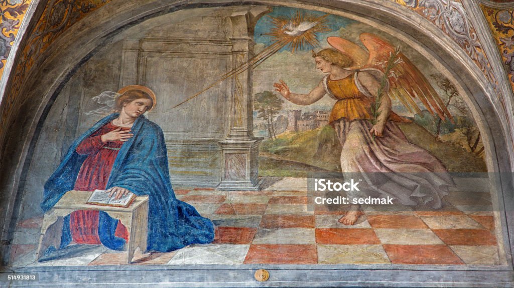 Padua - The Annunciation fresco in church San Francesco Padua - The Annunciation in the church San Francesco del Grande in chapel Cappella di Santa Maria della Carita by Girolamo Tessari (1523 - 24) Angel Stock Photo