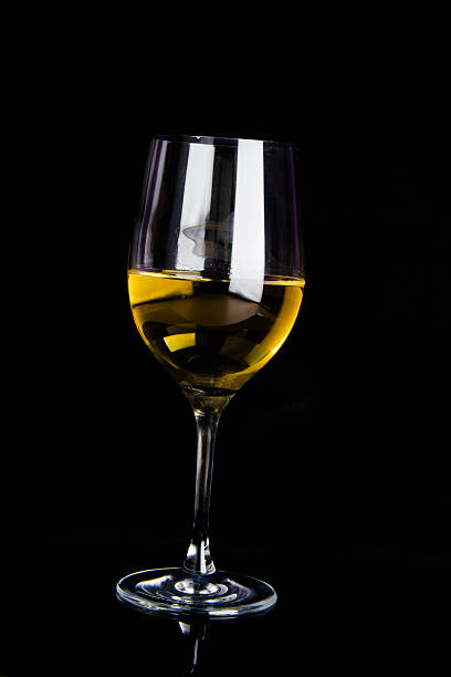 istock wine glass isolated on black background 514934430
