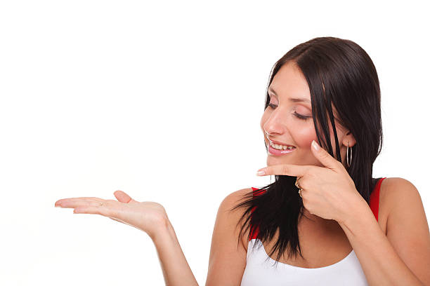 istock Young woman showing product open hand palm excited expression 514935399