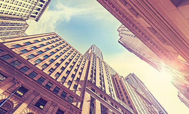 istock Vintage stylized Wall Street at sunset with lens flare effect. 514936020