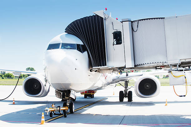 istock Airplane ready for boarding in airport hub. 514936246