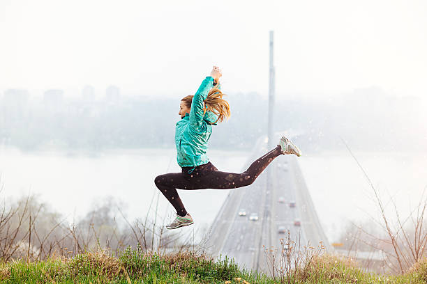 istock Female athlete ready for jogging on panoramic spot near city 514937086