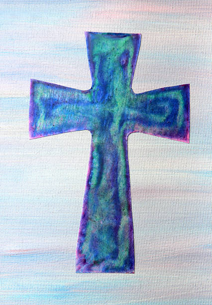 istock Abstract wax painted blue turquoise green purple cross on canvas 514937588