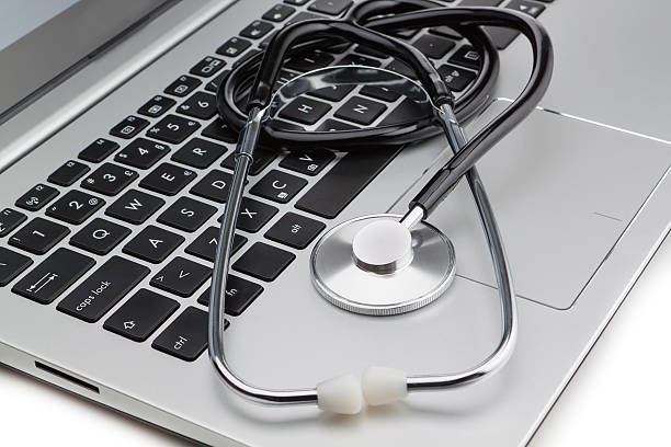 istock Medical stethoscope on a modern laptop, close-up. Isolated. 514938000
