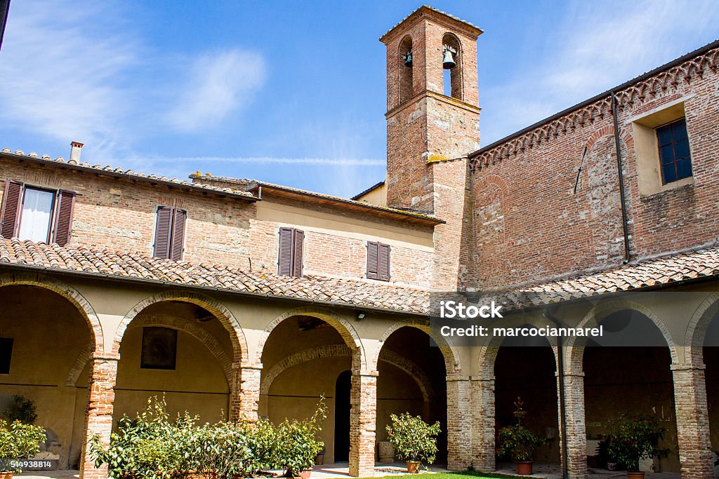 The Cloister in the Church of San Francesco in Chiusi The Cloister of the Convent in the Church of San Francesco in Chiusi near Siena, Tuscany, Italy Ancient Stock Photo