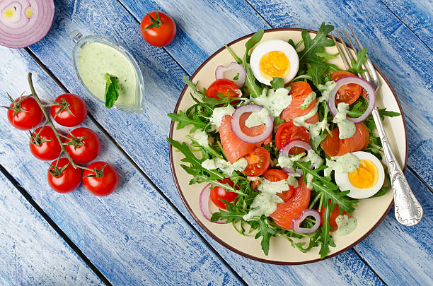 istock Smoked salmon salad with arugula, tomatoes, eggs and red onion 514944718