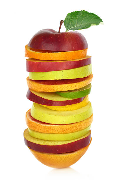 istock Fresh mixed slices of fruit in a row 514960297