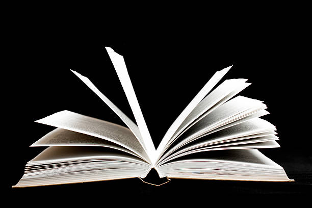 istock Old book on black color background 514961975