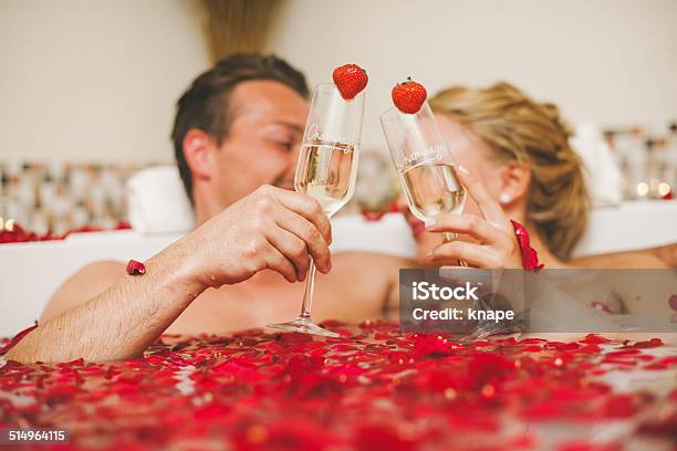 Couple Taking A Romantic Bath At The Health Spa Stock Photo - Download Image Now - Couple - Relationship, Romance, Bathtub