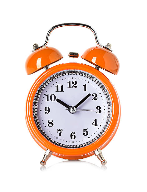 istock orange bell clock, alarm clock isolated on white background 514964215