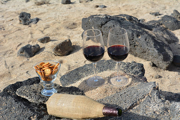 istock Two Wine Glasses And Bottle On the Tropical Beach 514966239
