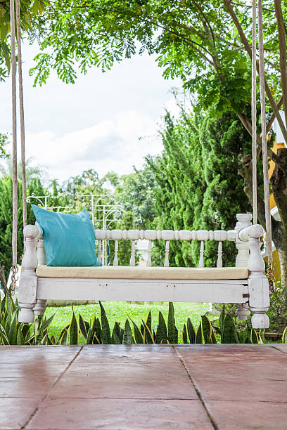 istock vintage swing and Turquoise blue green pillow 514966577