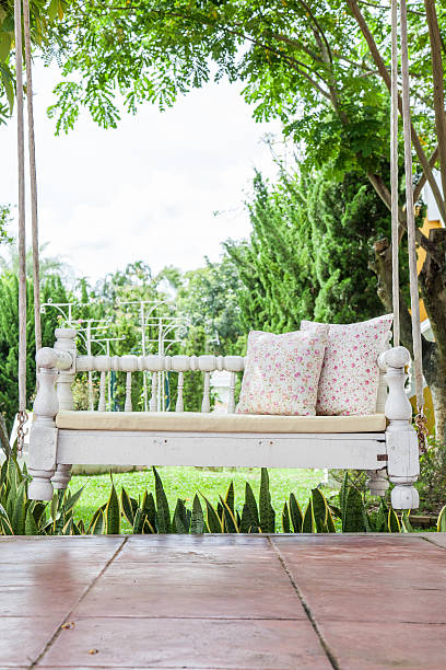 istock vintage swing and light pink flower pillow 514966605