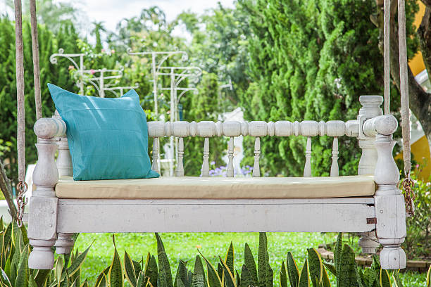 istock vintage swing and Turquoise blue green pillow 514966613