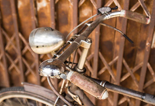 istock Vintage bicycle against an old metal wall 514968075