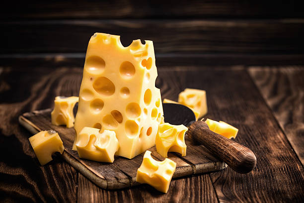 сыр - swiss cheese стоковые фото и изображения