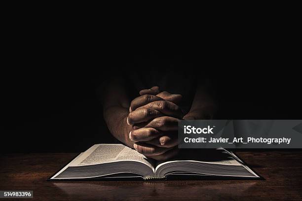 Praying In The Dark Stock Photo - Download Image Now - Praying, Bible, Christianity