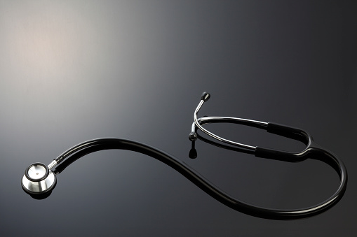 Stethoscope Isolated On Black Background Stock Photo - Download Image Now -  Black Background, Stethoscope, Doctor - iStock