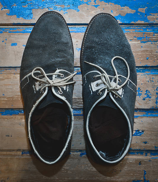 istock mens dirty shoes 514985980
