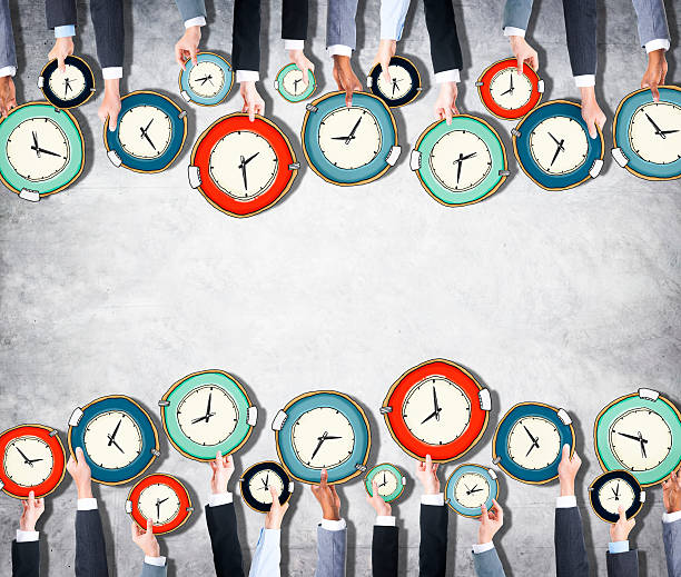 istock Group of Hands Holding Clocks 514989755