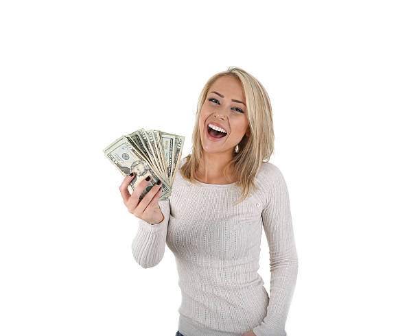 istock girl with money 514989779