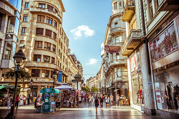 Serbia. Knez Mihailova Street, a main shopping mile of Belgrade. Belgrade, Serbia - September 23, 2015: Knez Mihailova Street. Street is the main shopping mile of Belgrade. Filtered photo with warm summer lighting. serbia stock pictures, royalty-free photos & images