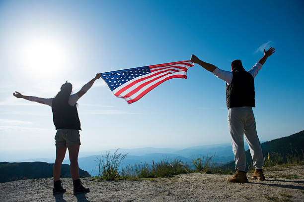 istock Couple in love holding American flag 514991057