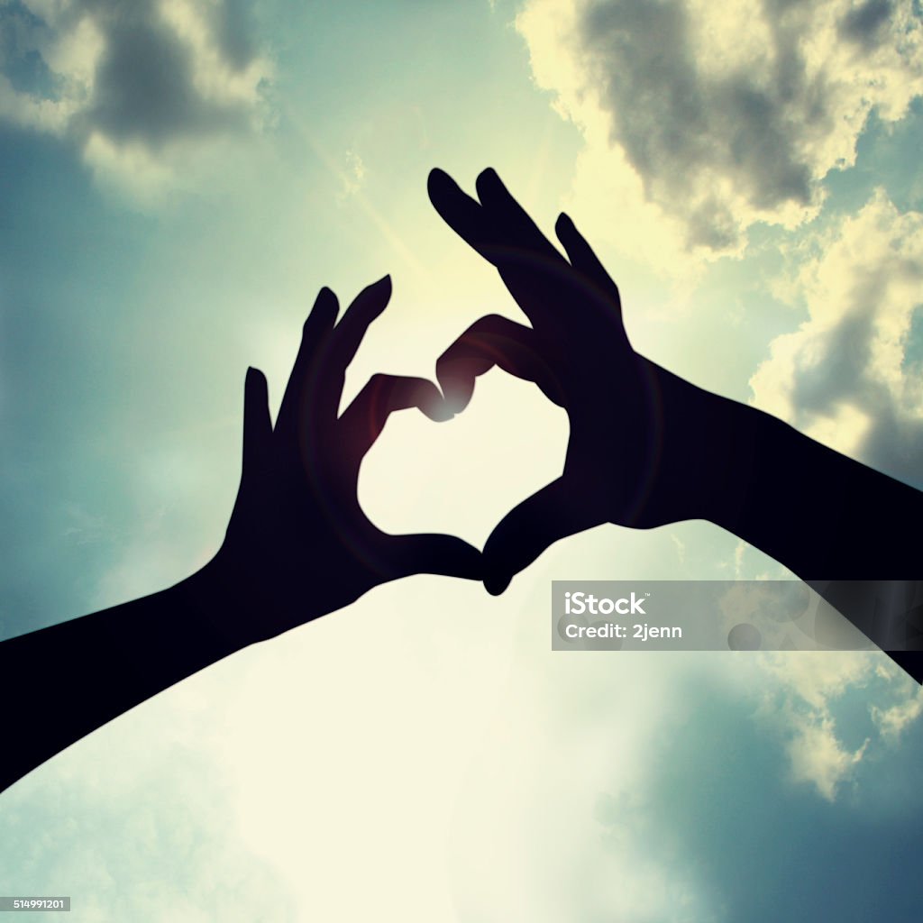 hand with love shape form a love shape by both hands Creativity Stock Photo