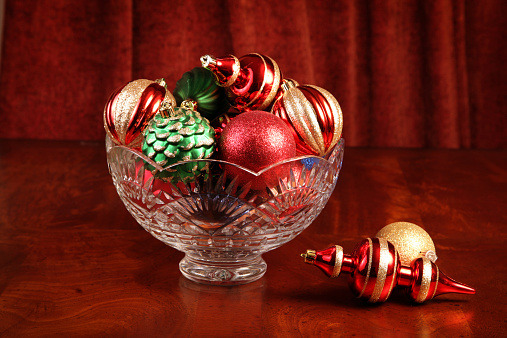Christmas ornaments in a crystal bowl.