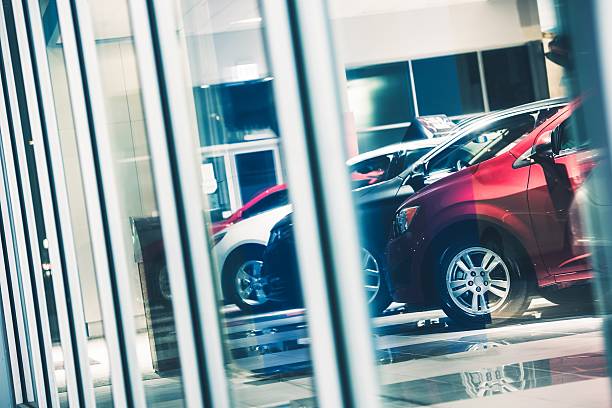 Car Dealer Window Shopping Car Dealer Window Shopping. Dealer Cars Stock. Showroom Exposition. car finance stock pictures, royalty-free photos & images