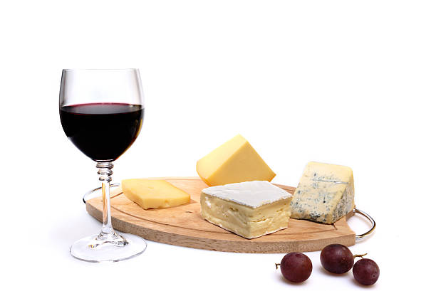 istock Glass of red wine and cheese 514994175