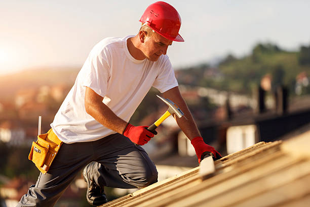 istock Construction roofer nailing wood board with hammer 514994603