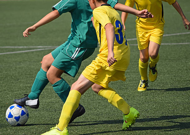Kids are playing soccer