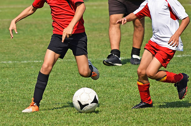 istock Children are playing soccer 515000400