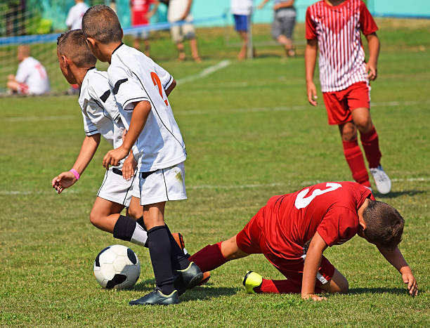 istock Kids are playing soccer 515002032